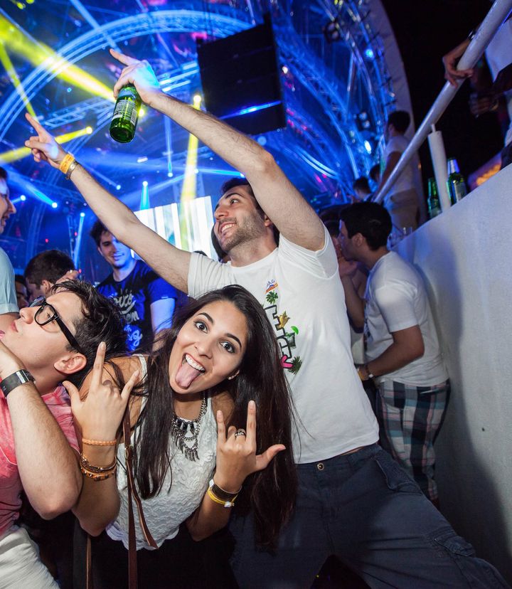 Friends from around the world posing and partying at a Zrce Spring Break night