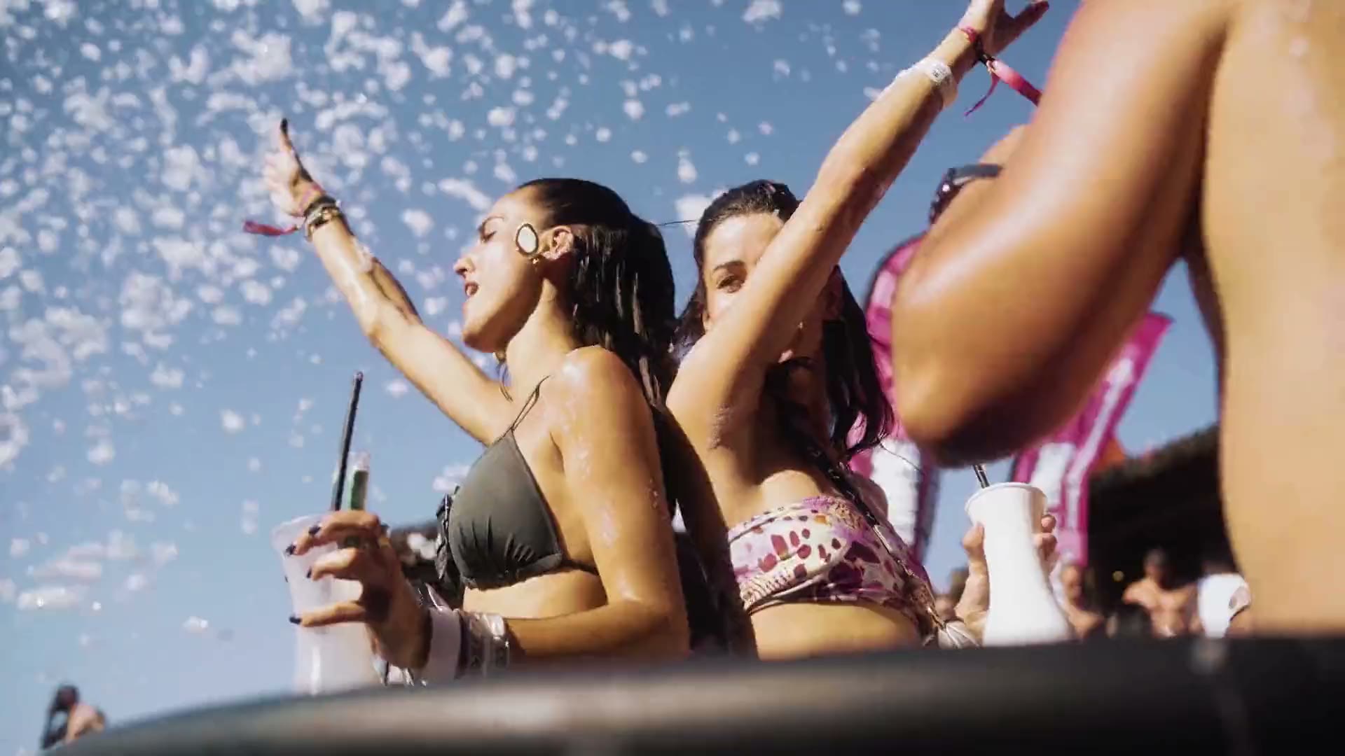 Girls dancing in the foam at a Zrce Spring Break Croatia boat party