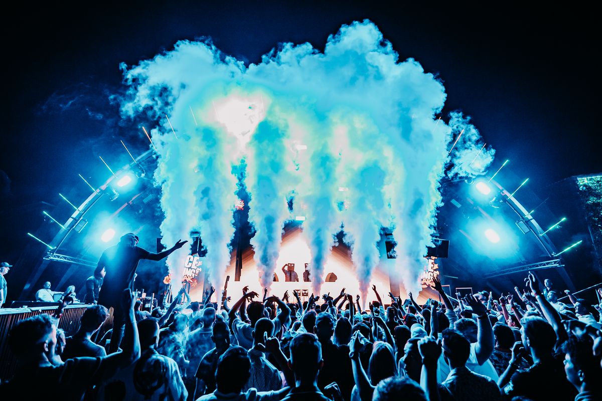 Blue CO2 blasts from the stage over the crowd