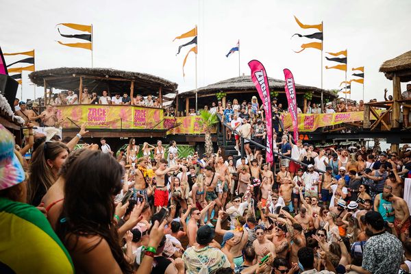 Packed daytime party at the beach club