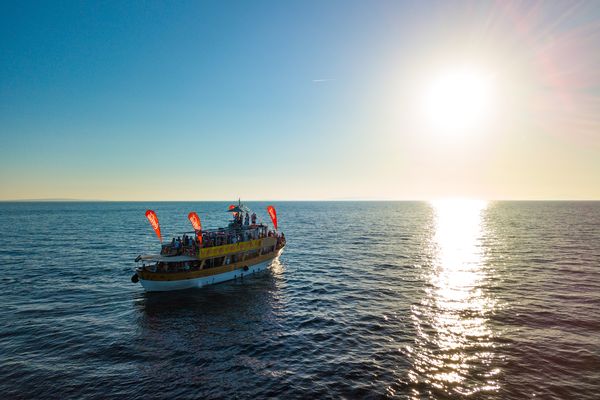 Party boat sailing into the sunset